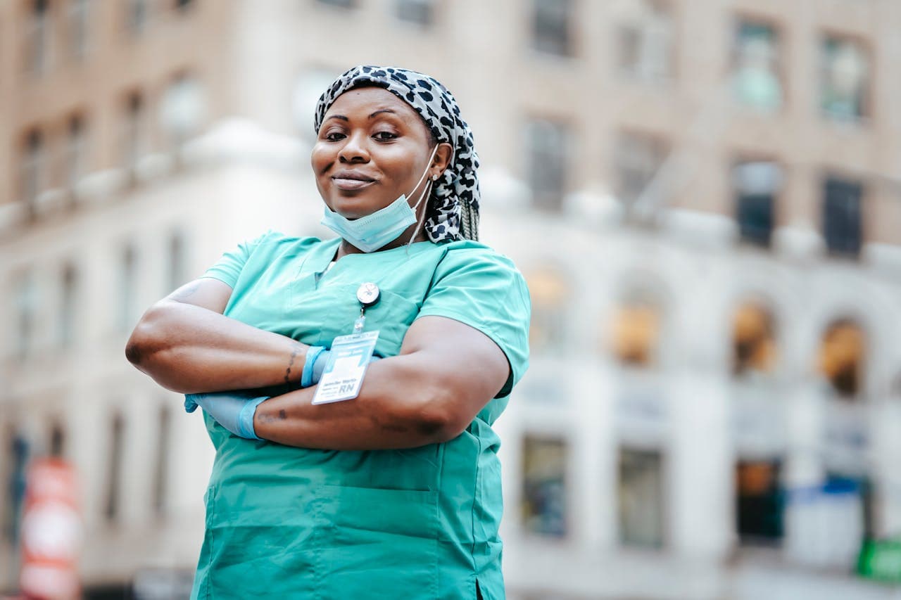 Healthcare worker in urban setting — representing IHA's workforce pipeline